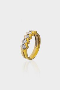 ANELLO - Peso gr 4 2 Misura 18 (58) in oro giallo e bianco con fila centralcon gemme sintetiche