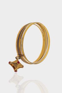 LOTTO DI CINQUE BRACCIALI - Peso complessivo gr 38 8 composto da: - tre bracciali rigidi in oro giallo  di cui due satinati e lavorati ed  [..]