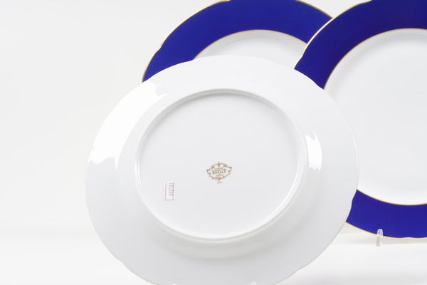 Dodici sottopiatti.<BR>Francia, Manifattura di Limoges, XX secolo.  - Asta Arredo per la Tavola - Associazione Nazionale - Case d'Asta italiane