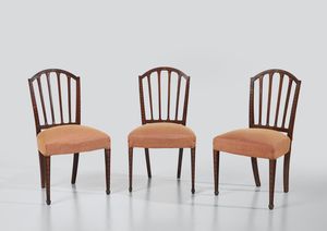 MANIFATTURA DEL XIX SECOLO - Tre sedie in legno intarsiato con schienale a giorno, gambe posteriori a sciabola, seduta imbottita
