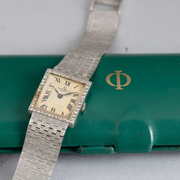 Baume & Mercier : Orologio in oro bianco 18k carica manuale con ghiera in brilllanti, bracciale integrato, 22x20 mm  - Asta Watches - Associazione Nazionale - Case d'Asta italiane