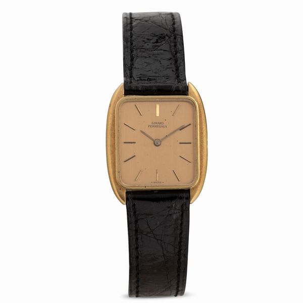 GIRARD PERREGAUX : Solo tempo in oro giallo di forma tonneau 18k carica manuale, quadrante champagne con indici applicati, 24x27 mm  - Asta Watches - Associazione Nazionale - Case d'Asta italiane