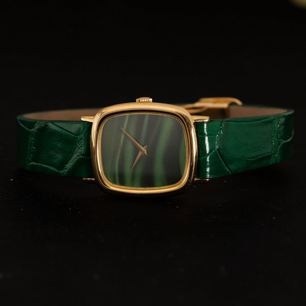 Baume & Mercier : Ellipse in oro giallo 18k carica manuale, quadrante color verde malachite, chiusura deployante, 27 mm  - Asta Watches - Associazione Nazionale - Case d'Asta italiane