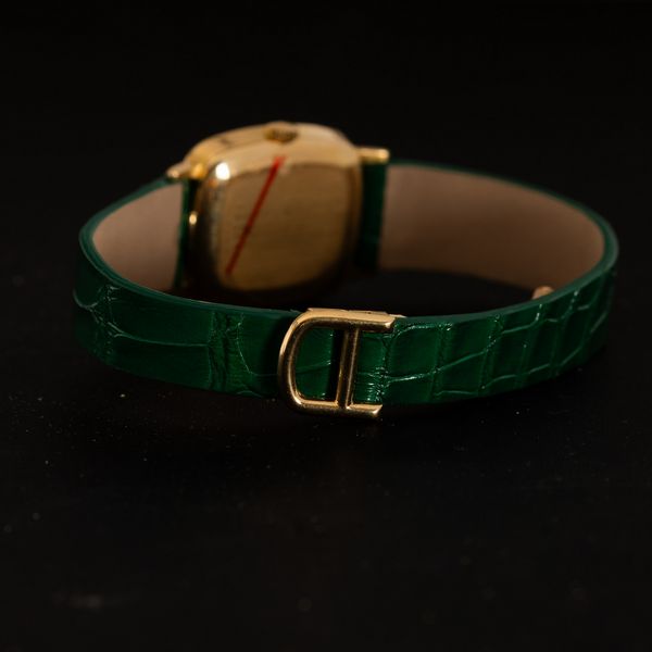 Baume & Mercier : Ellipse in oro giallo 18k carica manuale, quadrante color verde malachite, chiusura deployante, 27 mm  - Asta Watches - Associazione Nazionale - Case d'Asta italiane