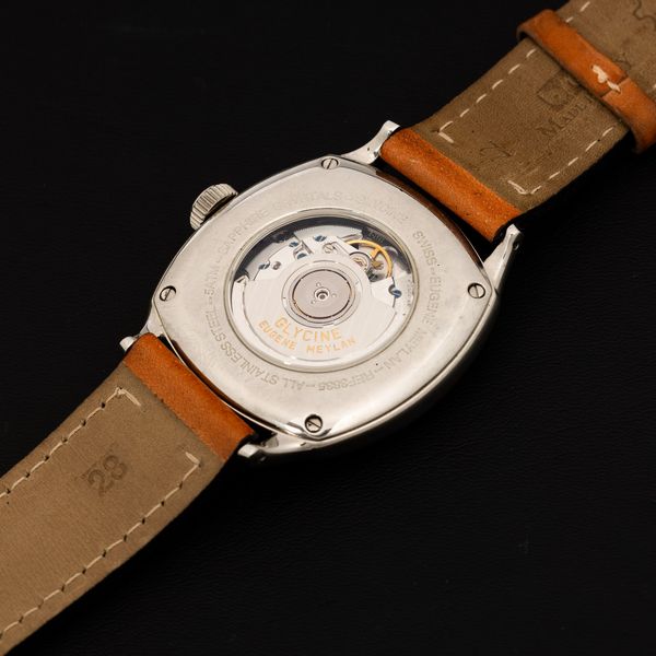 GLYCINE : Eugene Meylan automatico in acciaio di forma con quadrante argent� numeri Dec�, fondo a vista, 42 mm  - Asta Watches - Associazione Nazionale - Case d'Asta italiane