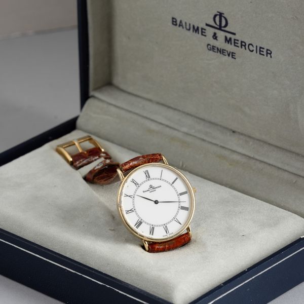 Baume & Mercier : Solo tempo in oro giallo al quarzo, quadrante bianco numeri Romani, con scatola e garanzia, 33 mm  - Asta Watches - Associazione Nazionale - Case d'Asta italiane