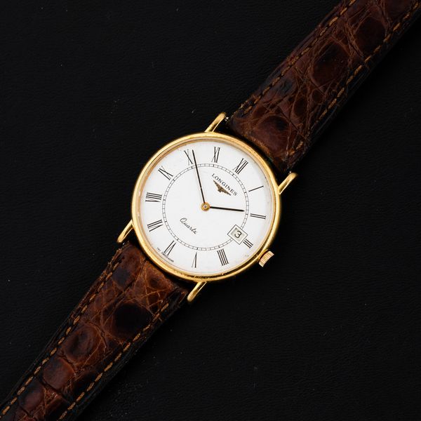 LONGINES : Orologio classico laminato, movimento al quarzo, quadrante bianco numeri Romani, 32 mm  - Asta Watches - Associazione Nazionale - Case d'Asta italiane