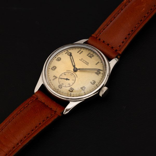 CYMA : Watersport in acciaio carica manuale fondo a vite, quadrante Argent� con numeri Arabi e piccoli secondi, 32 mm  - Asta Watches - Associazione Nazionale - Case d'Asta italiane