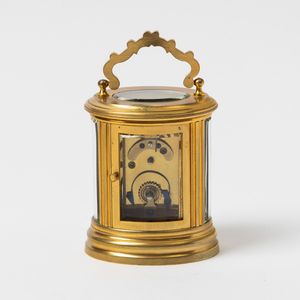 Pendolino da viaggio, anonimo, cassa in metallo e cristallo ,1930/1940, quadrante in smalto bianco, carica a chiavetta, custodia originale in pelle, 74x63 mm  - Asta Watches - Associazione Nazionale - Case d'Asta italiane