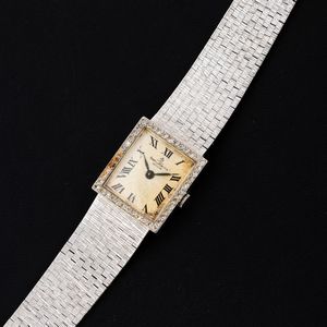 Baume & Mercier : Orologio in oro bianco 18k carica manuale con ghiera in brilllanti, bracciale integrato, 22x20 mm  - Asta Watches - Associazione Nazionale - Case d'Asta italiane