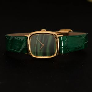Baume & Mercier : Ellipse in oro giallo 18k carica manuale, quadrante color verde malachite, chiusura deployante, 27 mm  - Asta Watches - Associazione Nazionale - Case d'Asta italiane