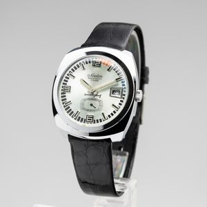 Newton Besançon : Newton Besan�on shockproof cassa in metallo con fondo a vite in acciaio, carica manuale, quadrante Argent� con datario e secondi al sei, cinturino in pelle, 35 mm, 1970 circa  - Asta Watches - Associazione Nazionale - Case d'Asta italiane