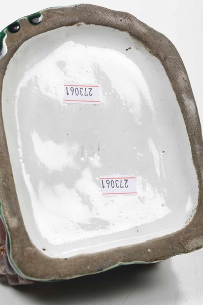 Figurina.<BR>Russia, probabilmente Manifattura Kusnetzov (Mosca), inizio del XX secolo.<BR>  - Asta Maioliche e Porcellane da Collezione - Associazione Nazionale - Case d'Asta italiane