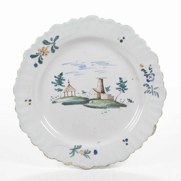 Piatto.<BR>Francia, Varages (Provenza-Alpi-Costa Azzurra), XVIII secolo.  - Asta Maioliche e Porcellane da Collezione - Associazione Nazionale - Case d'Asta italiane