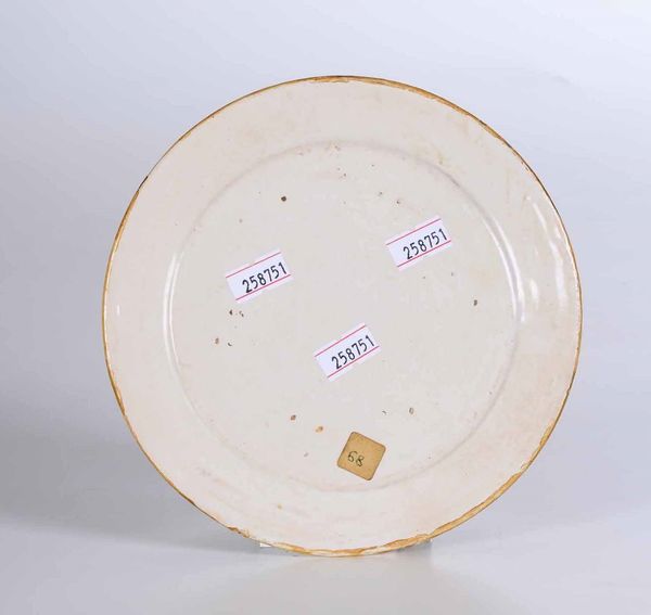 Piccolo piatto.<BR>Castelli, terzo quarto del Settecento.<BR>  - Asta Maioliche e Porcellane da Collezione - Associazione Nazionale - Case d'Asta italiane