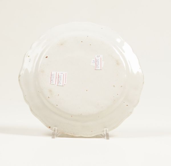 Piatto.<BR>Milano, Manifattura Clerici o Rubati, 1770 circa.<BR><BR>  - Asta Maioliche e Porcellane da Collezione - Associazione Nazionale - Case d'Asta italiane