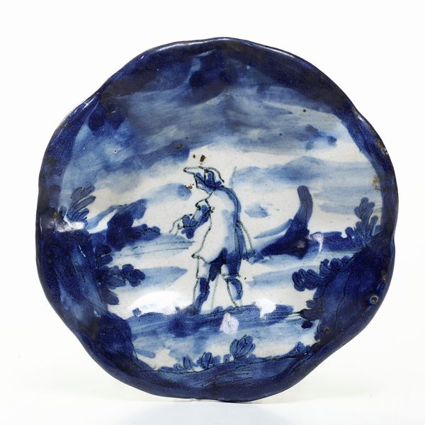 Piccolo piatto.<BR>Liguria, Albisola o Savona, prima met� del XVIII secolo.  - Asta Maioliche e Porcellane da Collezione - Associazione Nazionale - Case d'Asta italiane