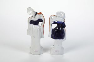 Coppia di figurine di scozzesi.<BR>Inghilterra, Staffordshire, periodo vittoriano, XIX secolo.  - Asta Maioliche e Porcellane da Collezione - Associazione Nazionale - Case d'Asta italiane