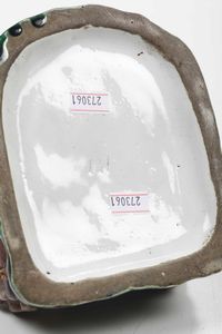 Figurina.<BR>Russia, probabilmente Manifattura Kusnetzov (Mosca), inizio del XX secolo.<BR>  - Asta Maioliche e Porcellane da Collezione - Associazione Nazionale - Case d'Asta italiane