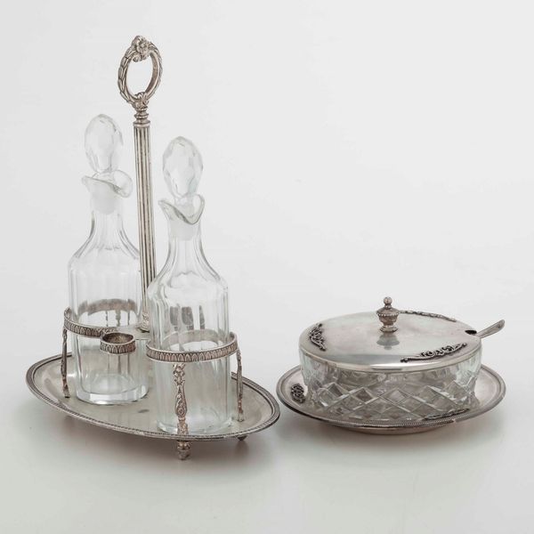 Set da tavola in argento composto da acetoliera, formaggiera e porta sale. Varie manifatture italiane del XX secolo  - Asta Argenti - Associazione Nazionale - Case d'Asta italiane