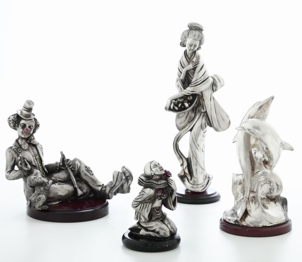 Lotto di 4 sculture ricoperte in argento. Differenti argenterie italiane del XX secolo  - Asta Argenti - Associazione Nazionale - Case d'Asta italiane