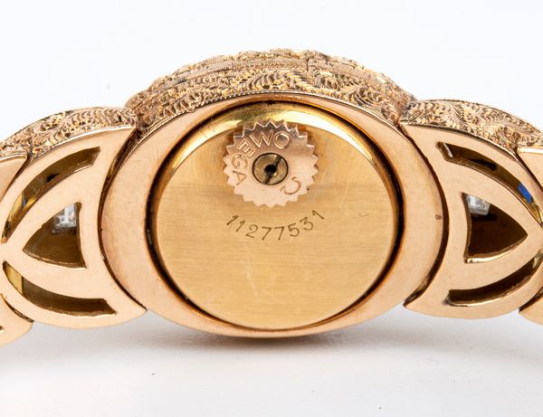 OMEGA : Orologio da polso Lady in oro giallo 18k, diamanti e zaffiri  - Asta Gioielli, Orologi e Penne - Associazione Nazionale - Case d'Asta italiane