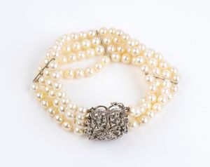 Bracciale in oro con 4 fili di perle e diamanti  - Asta Gioielli, Orologi e Penne - Associazione Nazionale - Case d'Asta italiane