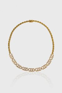 GIROCOLLO - Peso gr 29 Lunghezza cm 40 in oro giallo  composto nella parte centrale da segmenti in maglia appiattita in pavé  [..]