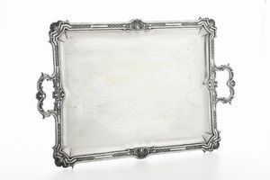 Grande guantiera biansata. Metz, XIX-XX secolo. Marchi tedeschi di occupazione (1871-1918). Argentiere �mile Puiforcat, Parigi dal 1857  - Asta Argenti da collezione | Antichi - Associazione Nazionale - Case d'Asta italiane