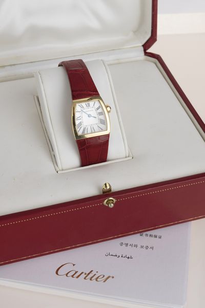 CARTIER : Elegante La Dona in oro giallo 18k, quadrante Argent� con numeri Romani, movimento al quarzo con scatola e garanzia  - Asta Orologi da Polso - Associazione Nazionale - Case d'Asta italiane
