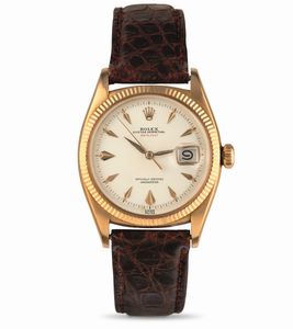 ROLEX - Raro ed elegante Datejust Ovettone �scritta rossa� ref 6305, in oro rosa 18k, quadrante Argent� gren� con indici fantasia, carica automatica