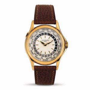 PATEK PHILIPPE - Raffinato ed attraente Worldtime ref 5110j in oro giallo, quadrante con lavorazione circolare Guilloch�, disco con 24 fusi orari girevole azionato da pulsante a pressione ad ore 10
