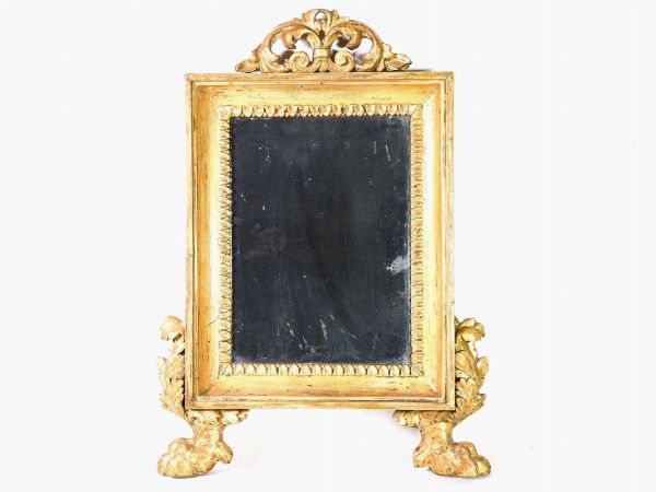 Specchiera in legno intagliato e dorato  - Asta Arredi e dipinti antichi da una villa a Viareggio -II - Associazione Nazionale - Case d'Asta italiane