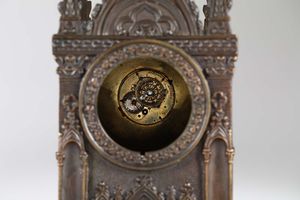 Due orologi gotici, uno in legno dipinto e uno in bronzo brunito e dorato, firmato Vivien a Gneve, Svizzera XIX secolo  - Asta Antiquariato - Associazione Nazionale - Case d'Asta italiane