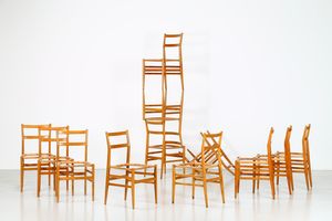 GIO' PONTI - Dodici sedie in frassino mod. Leggera, produzione Figli di Amedeo Cassina di Meda 1954. Eichetta originale presente