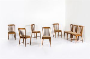 PRODUZIONE ITALIANA - Otto sedie in legno di noce  seduta imbottita rivestita in velluto. Anni '50 cm 91x42x47
