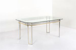 REGA ROMEO - Tavolo con struttura in ottone e metallo cromato  piano in vetro. Anni '70 cm 77x178x97