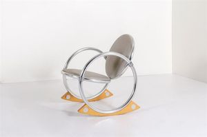 PANTON VERNER - Sedia a dondolo con struttura in metallo cromato e legno. Anni '60 cm 78x60x68
