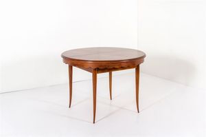BUFFA PAOLO - Tavolo allungabile in legno di noce. Anni '50 chiuso cm 82x115