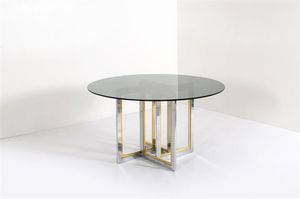 REGA ROMEO - Tavolo con struttura in acciao cromato e ottone  piano in vetro. Anni '70 cm 72x130