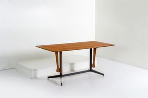 RATTI CARLO - Tavolo con struttura in metallo verniciato  terminali in ottone  piano in legno di teak. Anni '50 cm 76x169 5x79  [..]