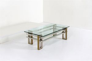 REGA ROMEO - Tavolino in ottone lucido e metallo cromato  piano in vetro. Anni '70 cm 41x130x70