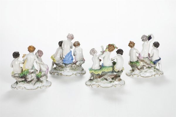 Quattro gruppi allegorici raffiguranti le quattro stagioni.<BR>Germania, Turingia, Manifattura di Rudolstadt, XX secolo.  - Asta Ceramiche - Associazione Nazionale - Case d'Asta italiane
