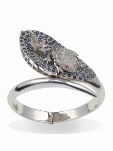 Bracciale rigido con pav� di diamanti e zaffiri  - Asta Gioielli - Associazione Nazionale - Case d'Asta italiane