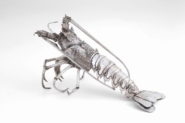 Aragosta in metallo argentato. XX secolo  - Asta Sei Secoli di Arti e Arredi - Associazione Nazionale - Case d'Asta italiane