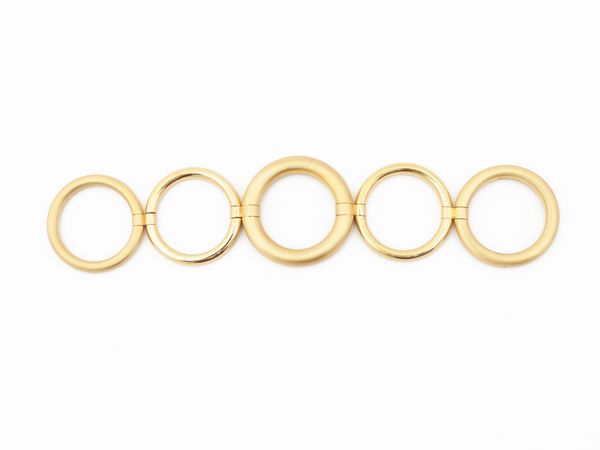 Pomellato, anello cinque fedi snodabili in oro giallo  - Asta Gioielli e Orologi - Associazione Nazionale - Case d'Asta italiane