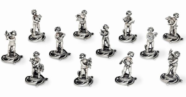 Dodici segnaposto a guisa di putti. Argenteria italiana della prima met del XX secolo  - Asta L'Art de la Table - Associazione Nazionale - Case d'Asta italiane