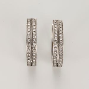 Orecchini ellittici in oro bianco e diamanti  - Asta Gioielli - Associazione Nazionale - Case d'Asta italiane