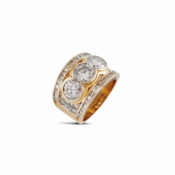 ANELLO A FASCIA CON DIAMANTI  - Asta GIOIELLI - Associazione Nazionale - Case d'Asta italiane