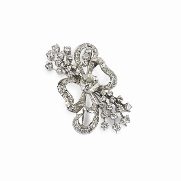 SPILLA A FORMA DI FIOCCO CON DIAMANTI  - Asta GIOIELLI - Associazione Nazionale - Case d'Asta italiane